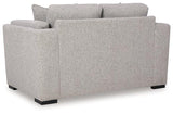 Ashley Furniture Evansley loveseat with plush fabric, cushioned armrests, and a stylish, contemporary design for cozy living rooms.