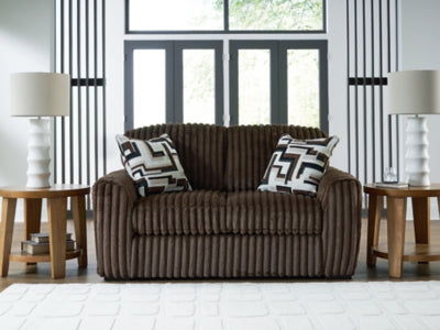 Midnight Madness loveseat by Ashley Furniture featuring plush dark upholstery and contemporary design, close-up shot.