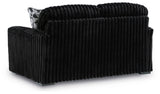 Ashley Furniture Midnight-Madness loveseat with plush dark upholstery and comfortable back cushions.