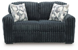 Ashley Furniture Midnight-Madness Loveseat with plush fabric and stylish design, shown from a head-on angle.