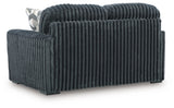Ashley Furniture Midnight-Madness Loveseat with plush fabric and stylish back design, perfect for cozy living room seating.