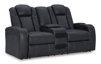 Ashley Furniture Fyne-Dyme power reclining loveseat with built-in console, plush fabric and padded armrests for comfort.