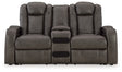 Ashley Furniture Fyne-Dyme Power Reclining Loveseat with Console, shown from the head-on angle with plush cushions and built-in cup holders.