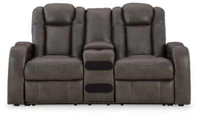 Ashley Furniture Fyne-Dyme Power Reclining Loveseat with Console, shown from the head-on angle with plush cushions and built-in cup holders.