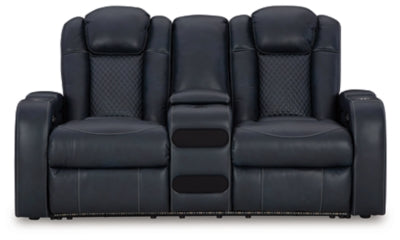 Ashley Furniture Fyne-Dyme power reclining loveseat with console, showcasing plush fabric, built-in cup holders, and reclining features.