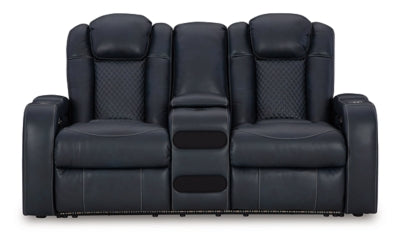 Ashley Furniture Fyne-Dyme Power Reclining Loveseat with Console, showing plush gray fabric and built-in cup holders.