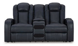 Ashley Furniture Fyne-Dyme Power Reclining Loveseat with Console, showing plush gray fabric and built-in cup holders.