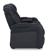 Ashley Furniture Fyne-Dyme power reclining loveseat with console, showing plush fabric, reclining mechanism, and armrests.