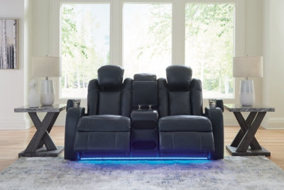 Ashley Furniture Fyne-Dyme power reclining loveseat with built-in console, featuring plush cushions and a contemporary design.