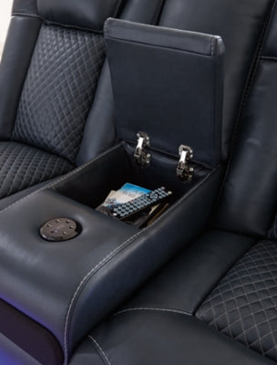 Ashley Furniture Fyne-Dyme Power Reclining Loveseat with built-in console, featuring plush upholstery and reclining mechanism.