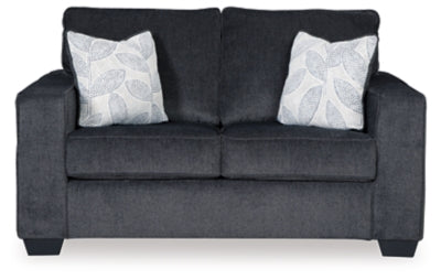 Ashley Furniture Altari Loveseat with plush fabric and modern design, shown in a cozy living room setting.