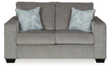 Ashley Furniture Altari loveseat with plush upholstery and cushioned armrests, shown from a head-on perspective.