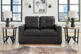 Ashley Furniture Barlin Mills loveseat with plush fabric and cushioned armrests, showcasing a stylish, contemporary design.