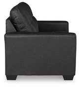Ashley Furniture Barlin Mills loveseat in neutral upholstery with plush cushions and wooden legs for comfortable seating.
