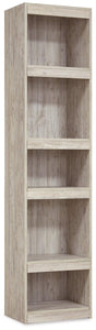 Willowton Pier media tower by Ashley Furniture featuring multiple shelves and storage compartments in a modern design.