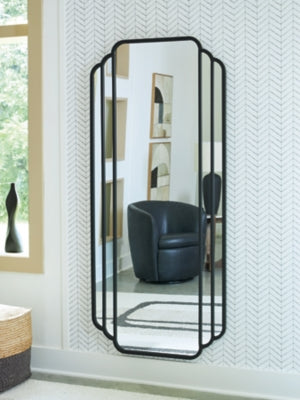Ashley Furniture Antigone floor mirror with a sleek, modern frame, standing tall in a contemporary room setting.