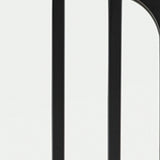Ashley Furniture Antigone Floor Mirror with a sleek, full-length design and modern frame, standing on a hardwood floor.