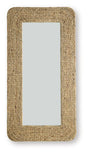 Ashley Furniture Norigan floor mirror with a sleek, tall rectangular design and a modern frame, standing upright in a well-lit room.