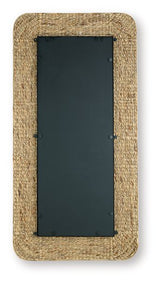 Ashley Furniture Norigan floor mirror with a sleek rectangular frame, standing upright in a modern room setting.