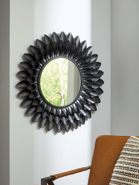 Ashley Furniture Ryenmour accent mirror with a sleek frame, perfect for modern home decor, shown in a close-up image.