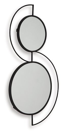 Ashley Furniture Shayham accent mirror with a sleek frame, hanging on a wall in a modern living space.