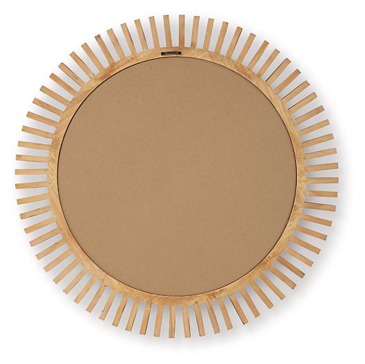 Ashley Furniture Tedwell Accent Mirror with a sleek frame, hanging on a wall, showcasing its modern design.