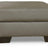 Ashley Furniture Darcy Ottoman with plush fabric and tufted top, ideal for living room or bedroom decor.