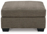 Mahoney Ashley Furniture oversized accent ottoman with plush fabric and sturdy wooden legs, perfect for living room decor.