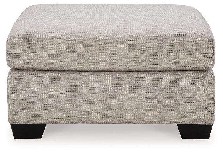 Oversized Mahoney accent ottoman by Ashley Furniture with plush fabric and tufted top, perfect for living room decor.