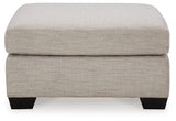Oversized Mahoney accent ottoman by Ashley Furniture with plush fabric and tufted top, perfect for living room decor.