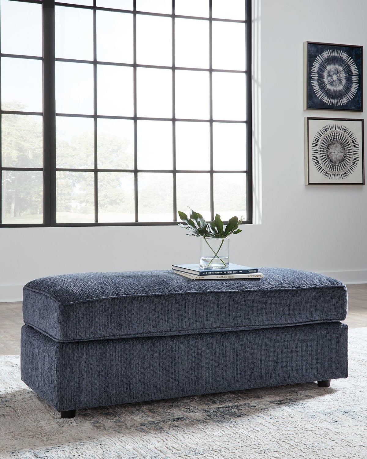 Oversized Albar Place accent Ottoman by Ashley Furniture in neutral fabric with plush cushioned top and wooden legs.