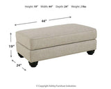 Ashley Furniture Asanti Ottoman, plush upholstered ottoman with wooden legs, designed for stylish living room decor.