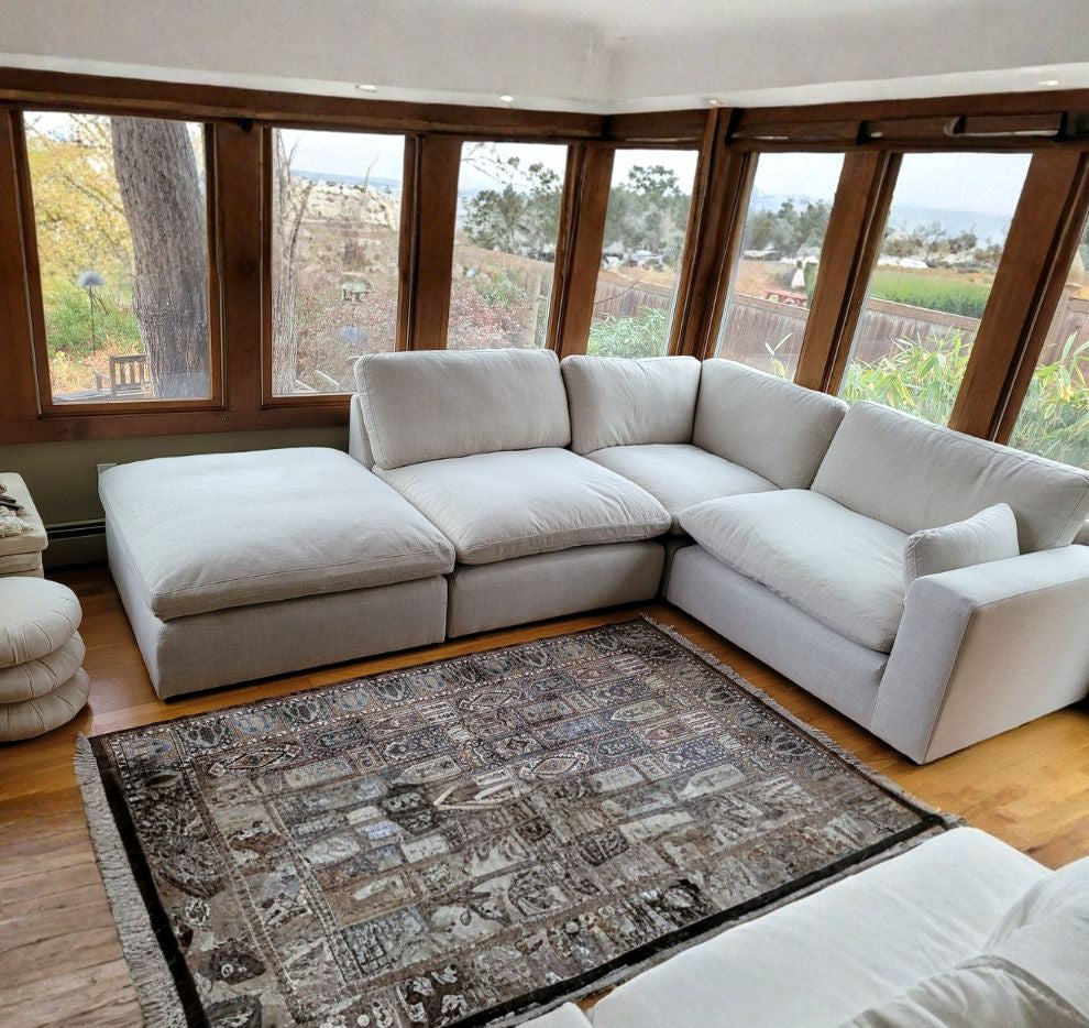 Ashley Furniture Atlas Cloud oversized ottoman with plush fabric and modern design, perfect for living room decor.