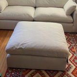 Large Atlas Cloud oversized ottoman by Ashley Furniture, soft fabric upholstery with plush cushioning, ideal for living room seating.