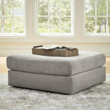 Large Avaliyah Oversized Accent Ottoman by Ashley Furniture with plush fabric and tufted top, perfect for living room decor.