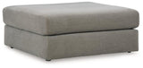 Ashley Furniture Avaliyah oversized accent ottoman with plush fabric and modern design, shown as a stylish living room accent piece.