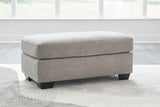 Ashley Furniture Avenal Park Ottoman, beige fabric upholstered with wooden legs, versatile storage and seating.