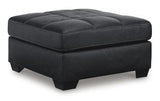 Ashley Furniture Barlin Mills oversized accent ottoman with plush fabric and sturdy wooden legs, ideal for living room decor.