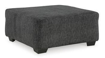 Oversized Ashley Furniture Biddeford Accent Ottoman with plush fabric and sturdy wooden legs, ideal for living room decor.