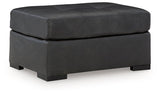 Ashley Furniture Brindley Pier oversized accent Ottoman with plush fabric and contemporary design, shown from an angled side view.