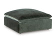 Ashley Furniture Carriage View oversized accent ottoman with tufted fabric and wooden legs, shown from an angle.