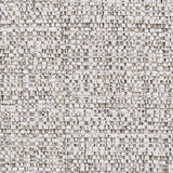 Ashley Furniture Koralynn oversized accent ottoman with plush fabric and a cylindrical shape, shown in a neutral beige color.