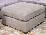 Large Ashley Furniture Lakepoint oversized accent ottoman with plush fabric and modern design, ideal as a stylish footrest or extra seating.