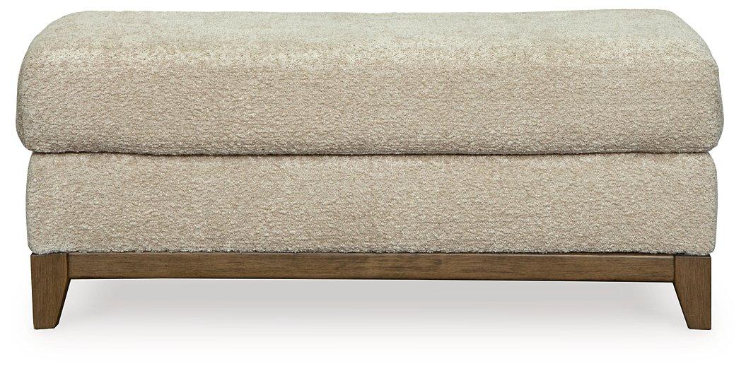 Ashley Furniture Parklynn Ottoman with soft fabric upholstery and storage space, featuring a stylish and functional design.