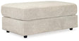 Oversized Ashley Furniture Soletren Ottoman with plush fabric and modern design, perfect for living room decor.
