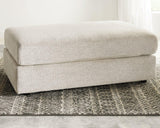 Oversized Ashley Furniture Soletren Ottoman with plush fabric and contemporary design, ideal for living room or lounge decor.