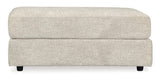 Oversized Ashley Furniture Soletren Ottoman with plush fabric and modern design, placed in a stylish living room setting.