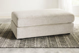 Oversized Ashley Furniture Soletren Ottoman with plush fabric and contemporary design, perfect for living room decor.