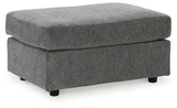 Ashley Furniture Stairatt Ottoman in neutral fabric with a cushioned top and wooden legs, ideal for living room or bedroom decor.