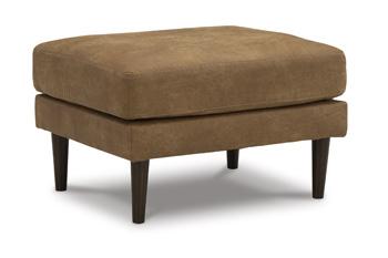 Ashley Furniture Telora Ottoman with plush fabric and tufted design, perfect for living room decor.